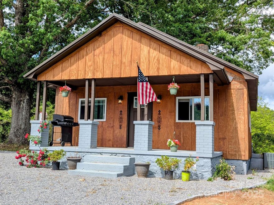 This beautifully updated 2 BR, 1 BA home sits on 2.09 deeded acres and offers the perfect blend of classic charm and modern convenience. Thoughtfully renovated in 2020, the home features a durable metal roof, new HVAC system, updated plumbing and electrical, blown insulation, new windows with custom blinds, and a rebuilt chimney for the cozy Jøtul woodstove. A brand-new deck and septic system were added in 2025.
Enjoy the timeless beauty of original heart pine hardwood floors throughout. Outside, take in the gorgeous views from the inviting front porch, perfect for morning coffee or evening sunsets. 2 wells on the property—one still connected and ideal for garden use. 
Centrally located: less than 10 miles to historic downtown Morganton 20 miles to Lake James public access, and under an hour to Asheville. Whether you're looking for a peaceful retreat, a mini-homestead, or a convenient base to explore Western North Carolina, this property offers it all.