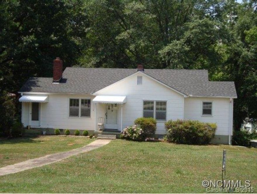 Cute home that has had a number of updates & improvements, including fresh paint inside & out, new propane wall-heater & new gas logs in fireplace, beautifully refinished hardwood floors, and new ceramic tile in bathroom and mudroom. Nice yard and circular drive around rear of home. Extra room with exterior access would be perfect for office or hobby area. Range/oven, refrigerator & light fixture in dining room do not convey.  Being sold as-is.  Motivated Seller!