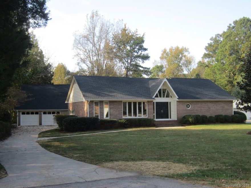 Spacious brick 1 level home in "Mint Condition" with all new windows, new carpet & tile to the floors, 2 baths totally renovated, both w/granite sinks & all new fixtures. Home just painted inside & out plus all new light fixtures. Great location & no city taxes. Just minutes to shopping & I-77.