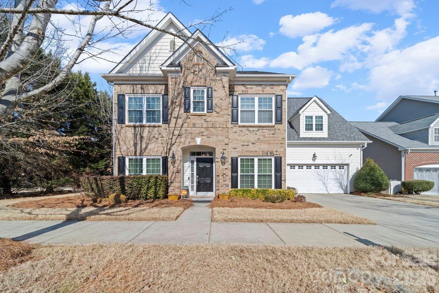 Seller is Offering $4,000 towards - Interest Rate Buy Down/Buyer's Closing Cost Assistance (to be used as the Buyer chooses) with an acceptable Offer. Welcome to Huntersville! Located in the desirable McCoy Crossing community, this beautifully maintained, move-in ready home offers more than 3,200 square feet of well-designed living space, including 5 bedrooms, 3.5 bathrooms, and an oversized two-car garage. From the moment you arrive, you’ll notice the classic traditional exterior with a partial brick façade and abundant windows that invite in natural light. Lovingly cared for by its original owner, the home is designed for both everyday comfort and effortless entertaining. Hardwood floors extend throughout the main level, where you’ll find a welcoming dining room, a comfortable living room, and a thoughtfully updated half bath with tile, wainscoting, and upgraded fixtures. The kitchen features ceramic tile flooring, stainless steel appliances, granite countertops, a center island, and a breakfast area ideal for casual meals or gatherings, all opening to a spacious family room with a gas fireplace perfect for relaxing evenings. Upstairs, the second-floor features five bedrooms and three full bathrooms, while the primary suite offers a tray ceiling, sitting area, walk-in closet, and additional storage. One secondary bedroom with double doors provides flexible space for a media room, office, fitness area, or guest suite. The backyard includes a generous patio and open space ready for cookouts, play, or pets. Conveniently situated near shopping, dining, and major highways, this home offers the space, layout, and location you’ve been searching for.