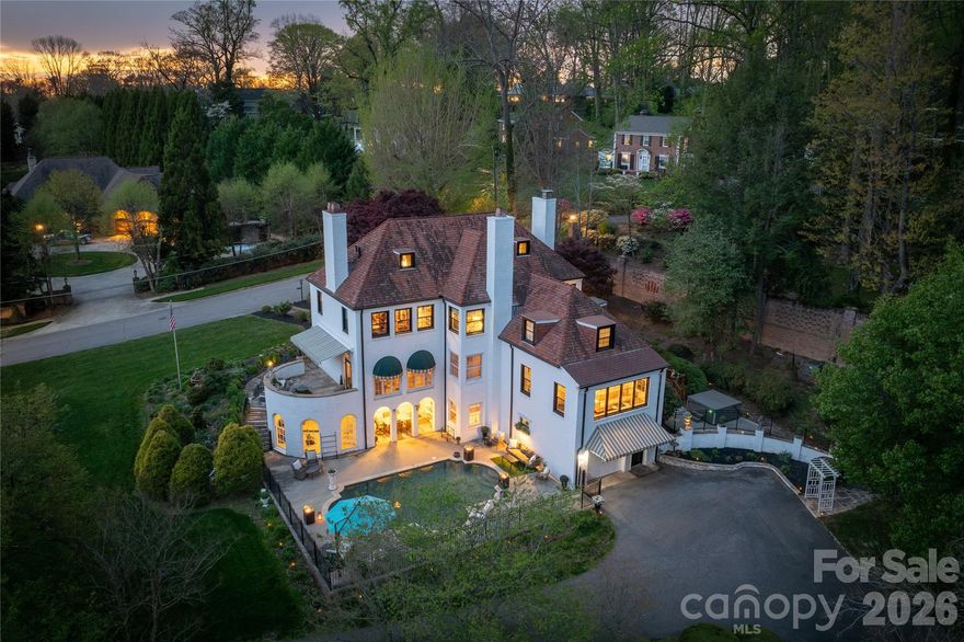 Discover this stunning home, a premier example of French Eclectic architecture, nestled on over 3 acres of pure privacy just outside downtown Lenoir. Conveniently located right off Highway 321, this property offers the perfect blend of tranquility and accessibility, with breathtaking views of Hibriten Mountain providing a serene backdrop for your own private oasis.
Step outside to find a gorgeous gunite pool, framed by elegant black iron fencing, ideal for both relaxation and entertaining. The property features a detached garage with four doors, accommodating multiple vehicles or offering ample storage space, along with a charming barn that adds character to the estate. Mature landscaping enhances the beauty of the grounds, showcasing large yellow magnolia trees, a striking Camellia tree, and over 15 different tree species thoughtfully planted throughout the property.
Inside, the home boasts a brand new bathroom that is nothing short of a spa retreat, featuring a spacious walk in shower adorned with exquisite Volakas Marble and an onyx pan. The interior also features new Pella Impervia windows, enhancing energy efficiency and aesthetic appeal. Several of the heat pumps are newer, ensuring comfort throughout seasons. The expansive basement offers a full kitchen and a dedicated movie theater, making it and ideal space for entertaining family and friends.
The architectural significance of this home is recognized in the NC State Northrip & O'Brien architectural records, reflecting its historical and aesthetic value. This property is not just a home, it's a lifestyle offering privacy, luxury, and distinctive charm. Most furnishings are negotiable, hot tub conveys with property. 
Don't miss the opportunity to own a piece of architectural history in a serene setting!