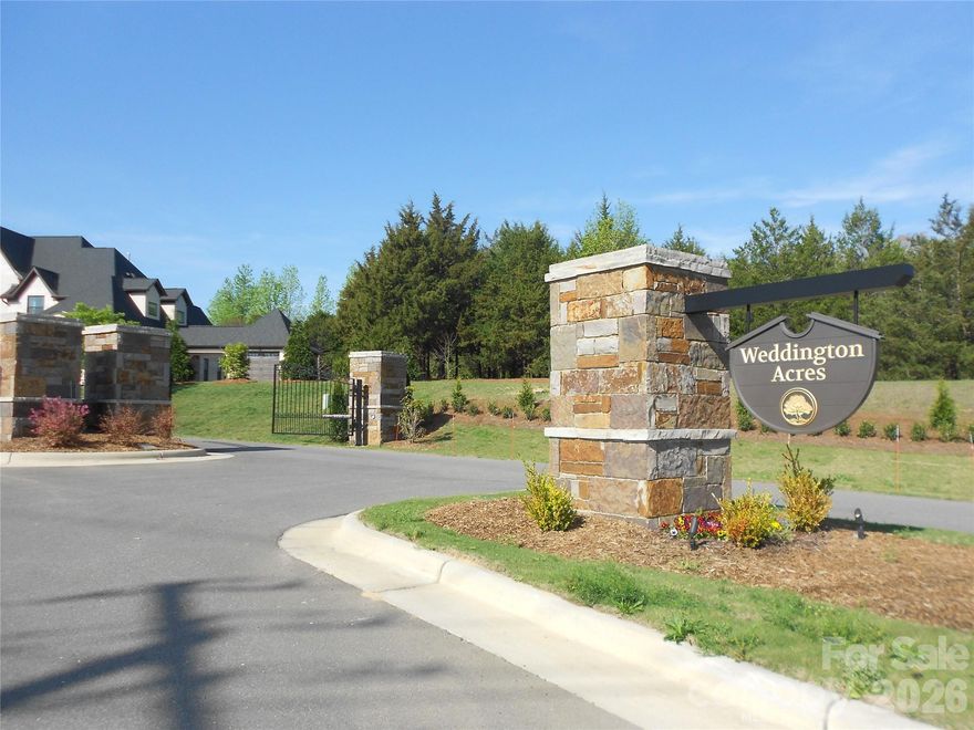 Welcome to Weddington Acres, an exclusive gated enclave nestled within the highly coveted Weddington school district. This extraordinary 1-acre homesite offers a rare and prestigious opportunity to design and build a truly custom luxury estate. Perfectly positioned, this premier lot is surrounded by exquisite residences valued at over a million and above, setting the tone for an unparalleled living experience. Bring your preferred builder and create a home tailored to your vision. The community is a serene, private setting, yet just moments from the upscale shopping, dining, and lifestyle destinations of Waverly, Wesley Chapel, and charming downtown Waxhaw. This location offers the perfect balance of luxury and convenience.