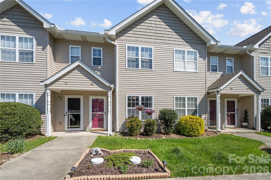 Well maintained unit in desirable Stafford Crossing, conveniently located near Airport Road dining and shopping, just 10 minutes to Hendersonville and 15 to Asheville.

Spacious, light filled living room offers room for both a TV area and office. The eat-in kitchen features a unique handmade tile backsplash, pantry, and dining area that opens to the back patio; perfect for relaxing or grilling. Main level includes newer vinyl  flooring throughout.

Upstairs, enjoy two large bedrooms with a Jack-and-Jill bath featuring dual vanities and separate toilet areas. Additional floored attic storage is easily accessible. HOA covers lawn and exterior maintenance.