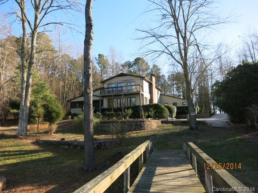 Unique...4 bedroom 3 bath unique home with gorgeous waterfront. European flair with tons of custom tile. Dry dock storage, boat lift building, and floating dock. Incredible view of the water on the 235ft of waterfront. Home has tons of potential. Some updates /possible repairs are probably needed so it is priced accordingly, well below taxed value (588k).