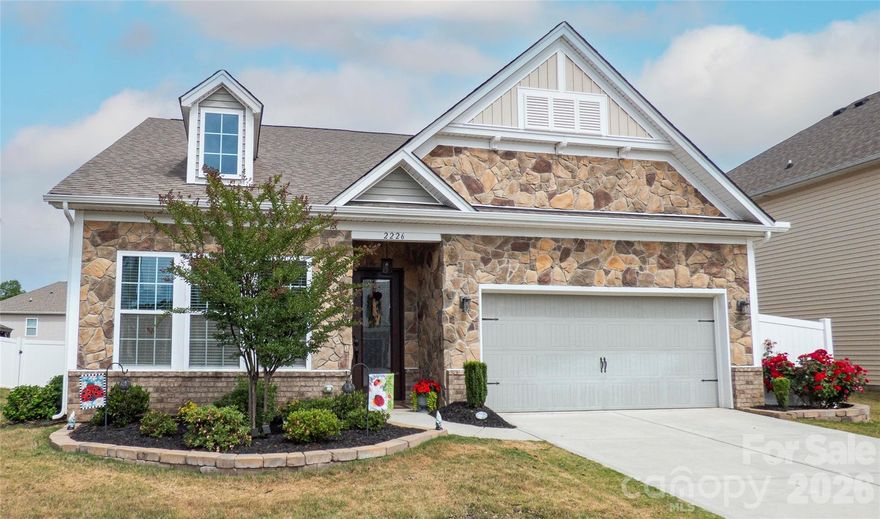 Welcome to this beautifully maintained 1.5-story home in the highly desirable Austin Corners neighborhood—conveniently located near shopping, dining, and easy highway access. From the moment you arrive, the stunning custom front door sets the tone for the quality and style found throughout.
Inside, you’ll find Beautiful  LVP flooring across the entire main level and no carpet anywhere in the home, offering both durability and easy maintenance. The main floor features two generously sized bedrooms with a full bath, perfect for guests or a home office setup. The open-concept living area is ideal for entertaining, showcasing a spacious kitchen with a massive island with granite countertops, gas stove, stainless steel appliances, and a bright eat-in dining area. The living room is anchored by a cozy gas fireplace with a beautiful stone surround.
The primary suite on the main level is a true retreat, complete with a trey ceiling, large walk-in closet, and a spa-like ensuite featuring dual vanities and an oversized tiled shower. A well-designed mudroom/laundry room with two closets adds everyday convenience & storage.
Upstairs, you’ll find a versatile loft/bonus space for either an office or gaming area, an additional bedroom, and a full bath.   Elegant wood stairs with wrought iron railing add a custom touch.
Step outside to your private backyard oasis featuring a covered patio, two pergolas, a fire pit, and an upgraded Belgard stone patio, all within a fully fenced yard—perfect for relaxing or entertaining year-round. This home has solar panels. This home combines thoughtful design, modern finishes, and an unbeatable location—don’t miss your opportunity to make it yours! Hot tub does not convey. 2 Mirrors in Primary Bath do not convey.