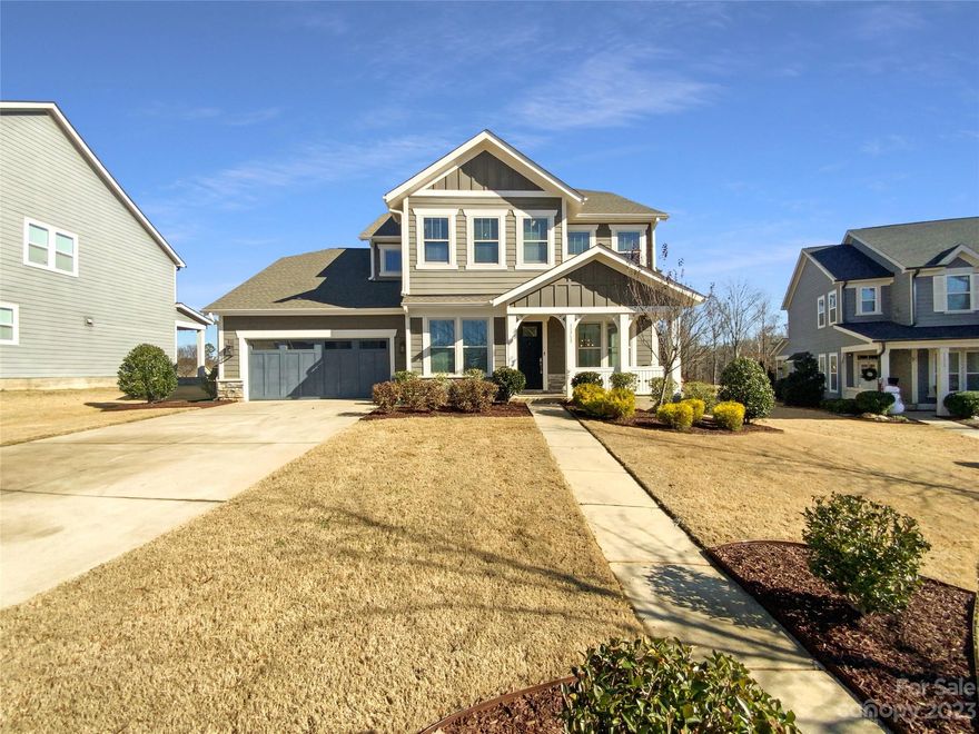 Welcome to this stunning property that offers an array of desirable features. Step into the cozy living room, complete with a charming fireplace that sets a warm and inviting ambiance. The natural color palette throughout the home creates a serene and tranquil atmosphere. The spacious kitchen boasts a center island, perfect for meal preparation or casual dining, and a beautiful backsplash that adds a touch of elegance. The master bedroom presents a walk-in closet, providing ample storage space. Additional rooms offer flexible living options to suit your needs. The primary bathroom is a luxurious retreat, featuring a separate tub and shower, double sinks, and good under sink storage. Outside, a covered sitting area awaits in the backyard, providing the ideal spot for relaxation or entertaining. Don't miss the chance to own this splendid property that offers an abundance of desirable attributes.