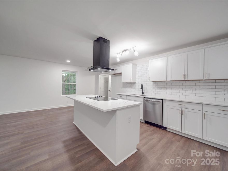 ***Qualifies for 100% financing + up to $20,000 in assistance that can be used towards closings costs, rate buy down, etc.***

Welcome home to this stunning 4-bedroom, 2-bath brick ranch on 0.8+ acres!

The open-concept kitchen boasts a spacious island, quartz countertops, and high end finishes! Truly a chef’s dream! The spacious master suite features a huge walk-in closet, private en-suite bath, and sliding doors to your outdoor oasis. A split floor plan ensures added privacy.

Outside, enjoy a large backyard, detached carport, workshop, and privacy fence. A charming front porch completes the picture.

Modern, stylish, and move-in ready. This home is waiting for you! Schedule your showing today!