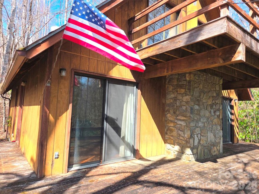 Great Value with Room to Improve! This mountain property includes two additional lots for a total of approximately 2.18 acres, offering privacy and future possibilities. Built in 1984, the home features several appealing elements along with the opportunity to add your own updates and finishing touches. The main level offers oak hardwood floors in the living room with a stone, wood-burning fireplace, dining area, kitchen, two bedrooms, full bath, and laundry for main level living. Flooring has not yet been installed in the two bathrooms or the upstairs bedroom, allowing the next owner to choose their own style and finish. The home is currently livable, making it a great option for someone looking to update a mountain cabin over time. Enjoy the peaceful, quiet setting with a bold, year-round creek and relax on the 14-foot-wide deck while listening to the rushing water. Two adjacent lots convey with the property—one on the northwest side of the home and one on the southeast side—adding space and flexibility - sell the lots? - add another house? Your Choice! Additional features include community well service (approximately $50/year), a 3-bedroom septic system, no HOA dues, no city taxes, and an elevation of over 3,700 feet.

The home would benefit from a new roof, crawl space insulation, and some exterior maintenance including areas of wood siding and exterior doors that show water-related wear. With a little work, this property could become a wonderful starter cabin, mountain retreat, or investment opportunity.