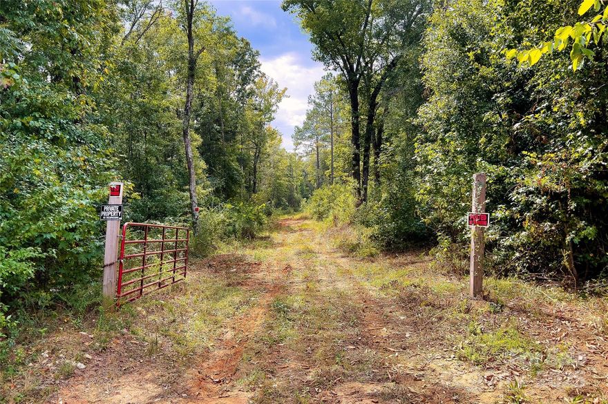 Price Reduced! If you’re an avid hunter or simply love the outdoors, this 53-acre property might perfectly suit your needs. The land was timbered five years ago, leading to fresh undergrowth that draws in whitetails. With both hardwoods and pines, plus nearly 700 feet of Reedy River frontage, you have plenty of variety for stand placements. A small creek that wanders through the property and flows into a beaver pond adds to the habitat diversity. The front elevation provides a nice vantage point to build a home or hunting retreat with great views of the river valley below. The property features a great trail system, recently repaired and expanded to offer even more routes for exploration. It’s ideal for taking your ATV or side-by-side out for a ride. Located near Lake Greenwood and within easy reach of Laurens and Greenwood, this unrestricted tract offers the seclusion you’re seeking. At the same time, you’ll enjoy convenient access to nearby amenities.