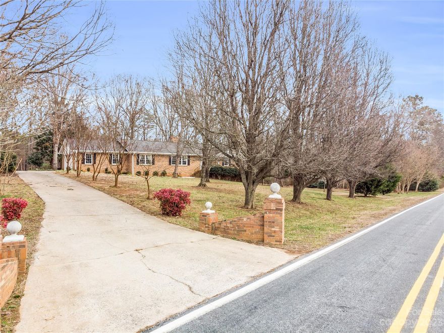 First time on the market - Custom built 3 Bed/2 bath brick ranch on 2 acres with a 24X30 insulated Workshop w/power. Home is located in Ellenboro just minutes to town and with unrestricted acreage.  Home offers one level living and most all appliances are under 5 years old and this home is move in ready.  Some beautiful upgrades have been made such as granite countertops in bathrooms, new countertops in kitchen and wood floors are beautifully refinished.  The kitchen, baths and laundry have tiled floors.  There is a full basement with walk out door and a fireplace and wood heater to supplement heat.  There is also a fireplace upstairs with gas logs. The laundry/mud room is just off of the kitchen from the garage for convenience.  Don't miss this rare find!!