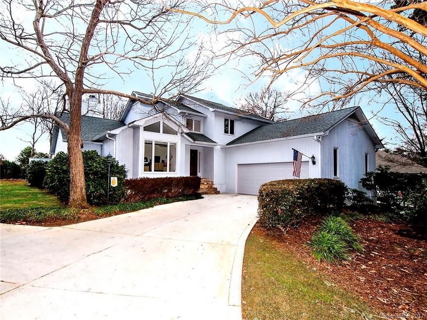 Light filled and open home in River Hills on 4th fairway. Kitchen features granite, stainless ,newer appliances and a view of the Golf Course. Main level master suite has see-thru fireplace . Master Bathroom has been updated with lovely cherry cabinetry, dual sinks, granite, tile walk-in shower plus two closets and a  patio. 2nd master up with two add'l bedrooms upstairs. Screened porch and decking. In ground irrigation. Two staircases. Office on main with built ins. Private. New driveway.