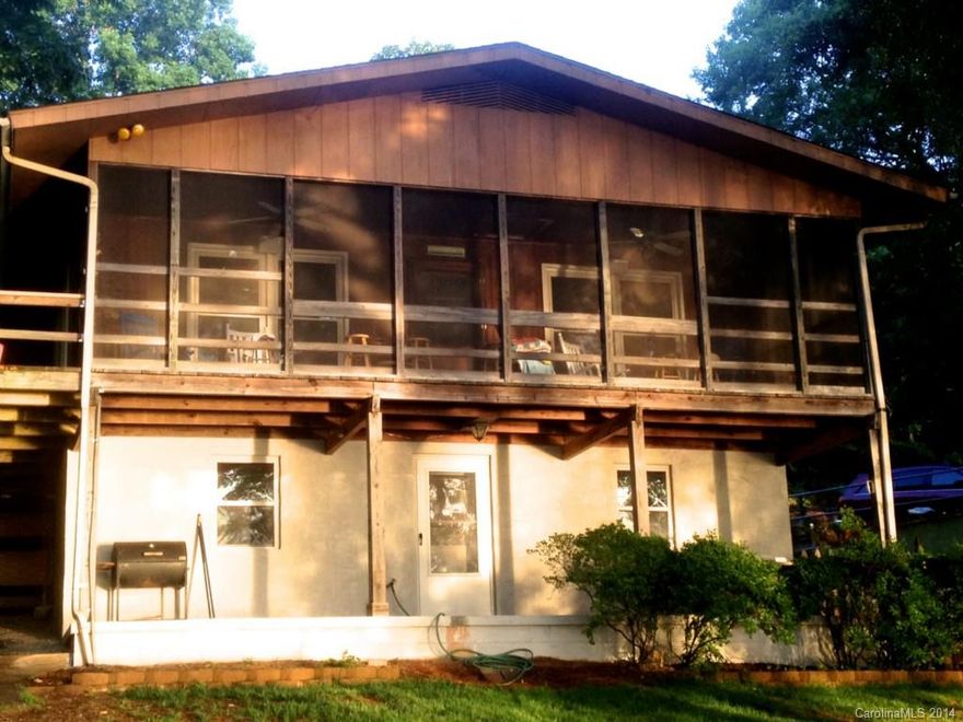 Enjoy long range views from the den, kitchen, dining area, screened porch or dock with this main channel Lake Tillery home.  Renovations include new roof, new hvac in 2012, completely renovated basement, and new carpet and linoleum. Washer, dryer,  and refrigerator are including and some furnishings are negotiable.  A double stall boat house can hold a boat and personal watercraft. This home could be your perfect weekender or primary residence.