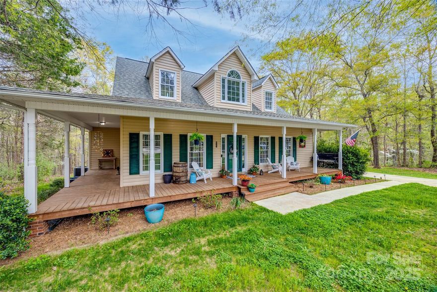 BACK ON MARKET AT NO FAULT OF SELLERS - INSPECTION/REPAIRS & APPRAISAL DONE! Nestled in a private backdrop & on a quiet cul-de-sac street, this home will draw you in to the serene setting on almost a full acre! A wrap-around front porch greets you as you make your way in on LVP floors. A cozy fireplace grounds the great room, & flows into the dining room & kitchen. The kitchen boasts dark stainless appliances & views of the backyard. The primary suite is on main, & has a beautiful tiled walk-in shower w/ frameless glass. Another full bathroom is on main, which leads up to a bedroom/bonus. 2 additional bedrooms & a full bathroom round out the upstairs. The backyard has an expansive deck that flows out to the spacious yard & wooded surround. Roof new 2024. Both HVAC units were replaced during their ownership, new hot water heater, & tons of details added including sidewalk, light fixtures, fresh paint, & more - see full list in attachments. With low SC taxes & no HOA dues, welcome home!