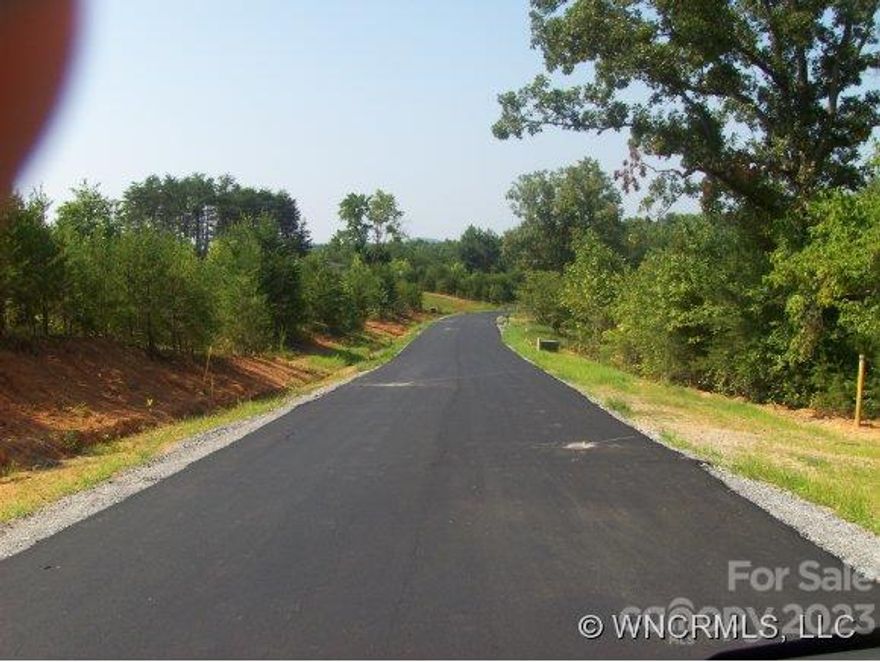 2.39  ACRES  WATER, PAVED ROADS,SOME CLEARED SOME WOODED. LIGHT RESTRICTIONS. AVAILABLE FOR A DOUBLE WIDE OR SITE BUILD. NEAR SCHOOLS.