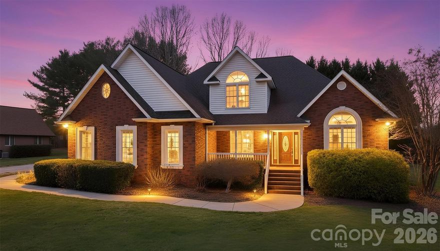 Welcome to this stunning 4-bedroom, 3.5-bathroom brick home located in the prestigious Rock Barn Country Club. This home features beautifully refinished hardwood floors and a custom kitchen with cabinetry designed for style and functionality. The spacious master suite offers a modern bathroom with high-end finishes, providing a perfect retreat. Enjoy versatile living areas, including a living room and a sitting room separated by a cozy double-sided fireplace, perfect for both entertaining and relaxation. With three additional bedrooms, a bonus room, and access to all the amenities of Rock Barn, this property offers the ideal blend of luxury and comfort. Seller is installing a free standing tub.