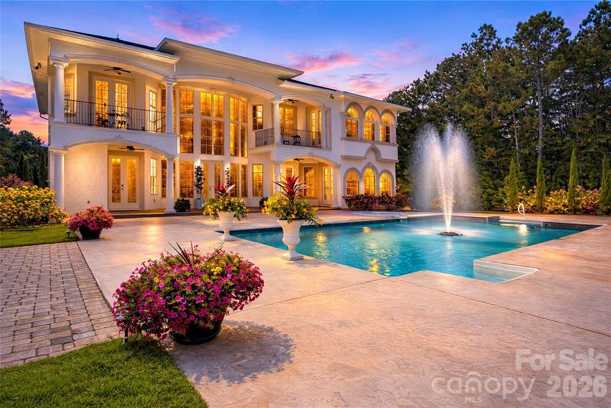 Nestled across more than 36 acres of rolling countryside, Belle Tesoro is a private, Tuscan-inspired estate offering rare scale, architectural character, and total seclusion just outside Spartanburg. Beyond the gated, tree-lined drive, a circular stone motor court and fountain set the tone for a home that feels both grand and deeply private. Inside, over 5,100 square feet of refined living space is defined by soaring ceilings, custom millwork, and natural light that highlights each room’s craftsmanship. A dramatic sweeping staircase anchors the main level, while the home’s layout supports both everyday living and effortless entertaining with a chef’s kitchen, formal dining, and a library with timeless finishes. Multiple fireplaces add warmth throughout, and the primary suite is a true retreat with spa-style bath, private balcony, and serene views across the grounds.

Outdoors, covered verandas and patios extend the living experience to a resort-style pool and fountain surrounded by manicured lawns and mature trees. Beyond the immediate homesite, the acreage offers an exceptional blend of cleared pasture and wooded privacy—ideal for those seeking room to expand, explore, or create a legacy property with space for gardens, recreation, or agricultural lifestyle use (see tax records for land designation). Belle Tesoro delivers what rarely exists in this market: a high-end estate residence with privacy, presence, and flexibility—an Italian-inspired sanctuary designed for a buyer who wants something truly distinct.