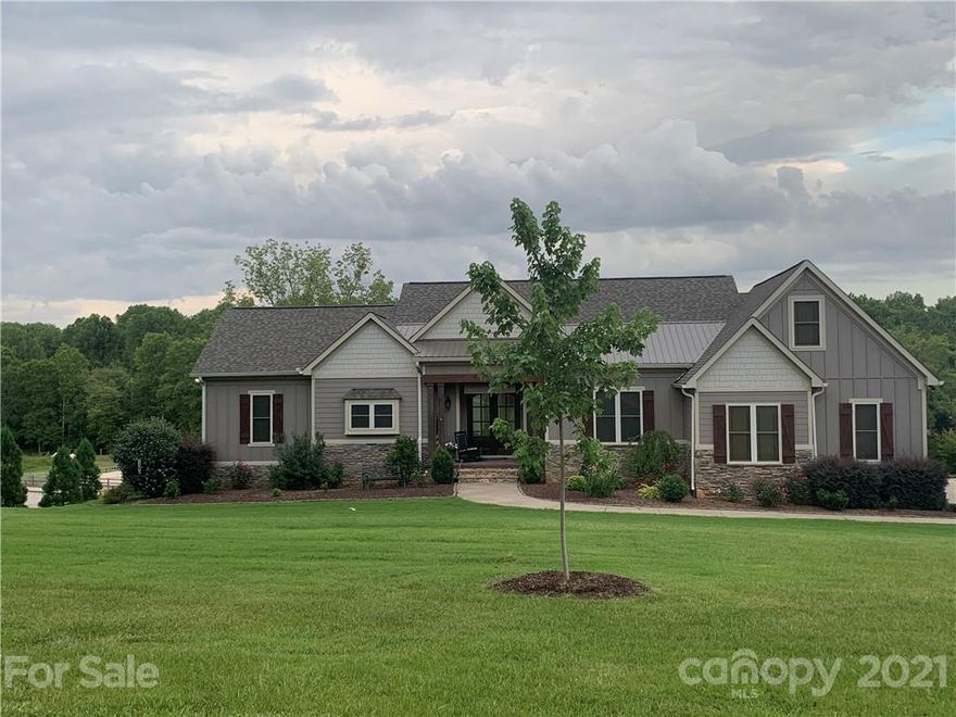 Located in the quaint town of Van Wyck, this is a one of a kind home with majestic views in a private conservancy neighborhood- filled with various wildlife. Natural light floods the home bringing an indoor-outdoor feeling. The hobby farm welcomes horses in an open air barn with plenty of pasture and paddock options or gardening and additional storage. Open concept provides entertaining inside around a custom stone fireplace or oversized peninsula and dining nook. Spill out on the expansive deck or relax on the side screen porch while watching the deer and horses graze. SPACES-MAIN: Master Suite with private deck entrance.Pantry and Master closet have custom shelving UPPER AREA -FROG or Bonus/Bdrm retreat  BASEMENT: Many options as the bdrms/baths flank the 2nd family room. Huge concrete patio under dec and a private entrance to to basement and dog bath.Unfinished areas w/ built in shelves for storage. COMFORTS:Whole house automatic generator, water softener-filter. Fiber Internet!