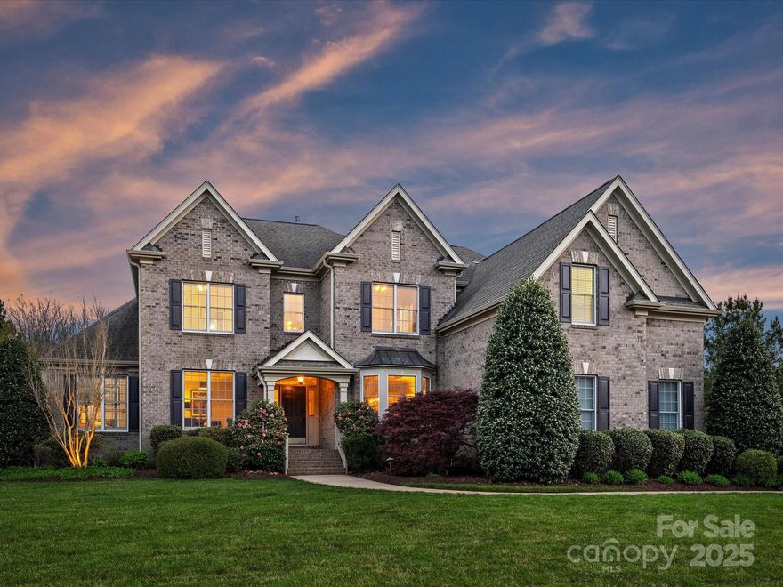 This impressive 5-bedroom home on quiet cul-de-sac sits on a flat almost 3/4-acre lot in highly sought-after Marvin Creek. Main level features primary bedroom with office/sitting room and fireplace. Large light-filled den opens to kitchen, sunroom, & beautiful hardwood floors. Completely renovated kitchen boasts leathered granite countertops, updated appliances, Wolfe induction stove featuring hood. Lots of room to grow with multiple large bonus and recreation spaces, and 3-car garage with plenty of storage. Outside, enjoy stone patio with outdoor fireplace, built-in gas grill, and Trex deck—ideal for entertaining. Incredible neighborhood amenities include clubhouse, pool, lazy river, basketball, tennis courts, and more—just a short distance away. This home provides luxury living with all the modern upgrades in a desirable community! Don't miss out.