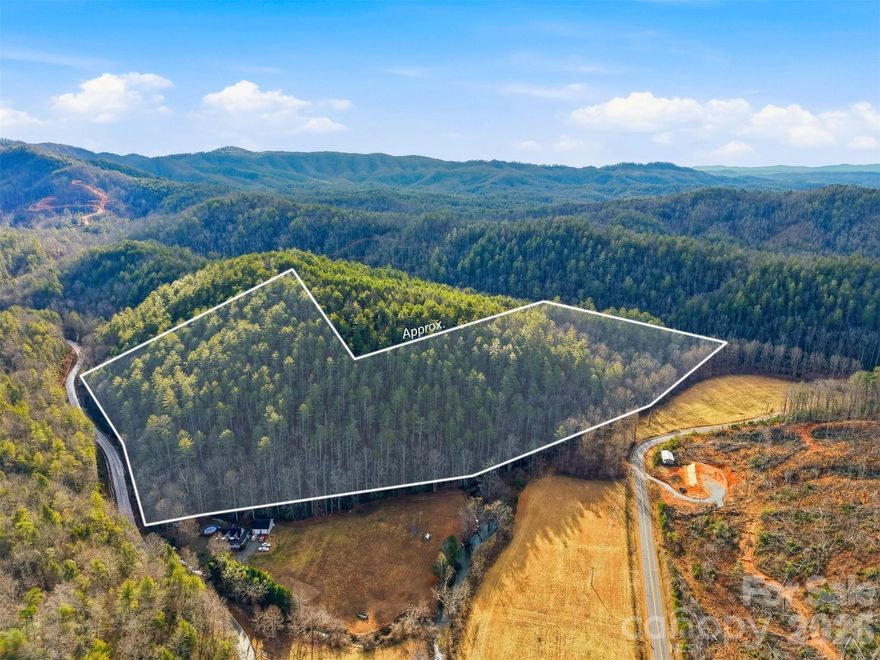 Tucked away in the scenic foothills of the Blue Ridge Mountains, this stunning 22.48-acre property offers the perfect blend of privacy, natural beauty, and convenience. Mature trees and a picturesque creek bordering the property create a peaceful, storybook setting ideal for your dream home or private retreat. A gradual mountain rise provides an incredible opportunity to build at the top and take full advantage of breathtaking, long-range views.

Wake up to sweeping mountain vistas and unwind to the soothing sounds of flowing water below. With ample space for a custom home, guest house, gardens, or private trails, this expansive tract provides both seclusion and flexibility.

Enjoy easy access to Highway 321, making travel simple and convenient. Located just minutes to Blowing Rock or Hickory, you can experience fine dining, shopping, and outdoor recreation while still enjoying the tranquility of country living. 952 feet of road frontage to Kirby Mountain Road, allowing several options to enter the property across the creek. 

Come experience the beauty, serenity, and potential of this rare Blue Ridge foothills offering — your mountain dream starts here.