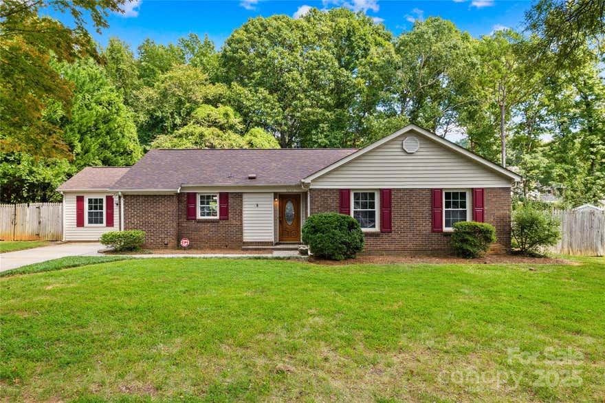 Situated on over a third of an acre in the established Birnam Woods community, this beautifully updated brick ranch offers the perfect mix of comfort, style and versatilty. Featuring 3 bedrooms and 3 full bathrooms, including TWO spacious primary suites, it’s ideal for multi-generational living or hosting guests. One primary suite includes a generous walk-in closet and a relaxing soaker tub. Enjoy the bright, inviting sunroom with views of the pool—perfect for year-round enjoyment. The wood burning firelpace also offers a great space to relax or entertain. Recent updates include: kitchen with induction cooktop (2011), roof and HVAC system (2023), new windows and LVP flooring throughout the main living area (2025). The split-pan layout is ideal, while the expansive yard offers a space with endless possiblities for outdoor entertaining and leisure. With its prime location and thoughtful updates, this Birnam Woods beauty is move-in ready and ready to welcome you home!