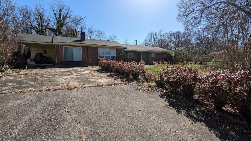 Large home near downtown Clover is ready for new owners to update and make their own. Home is currently three bedrooms and one bathroom but the right vision and updating can expand on this area. The home backs up to Roosevelt Park and located in a well established neighborhood. The property is currently being recombined/subdivided and annexed into the city of clover (half of the property is currently York County). Investors take note, R-7 zoning allows for duplex properties, so that may be a possibility, if this is the intention, please verify with the City of Clover. Listing agent has ownership interest in the property.