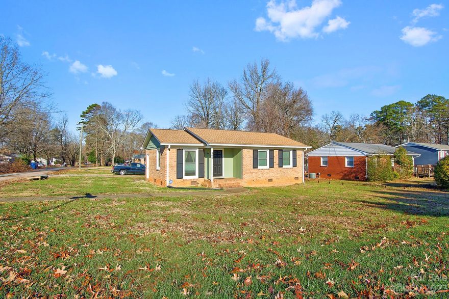 Negotiable!! Charming Brick Ranch- Close to shopping, schools, dining out!  3 carpeted bdrms, 1 bath with walk in shower, corner lot with carport and 2 outbuildings, one with electric. Bright, cheery kitchen with granite countertops. Separate laundry room off kitchen. Spacious primary bedroom with ceiling fan. Two additional bedrooms make for plenty of space! Improvements include blown in insulation, h/w heater insulated, leafguard gutter system, security system and front door sealed. Come for your private showing before this beauty is gone!!