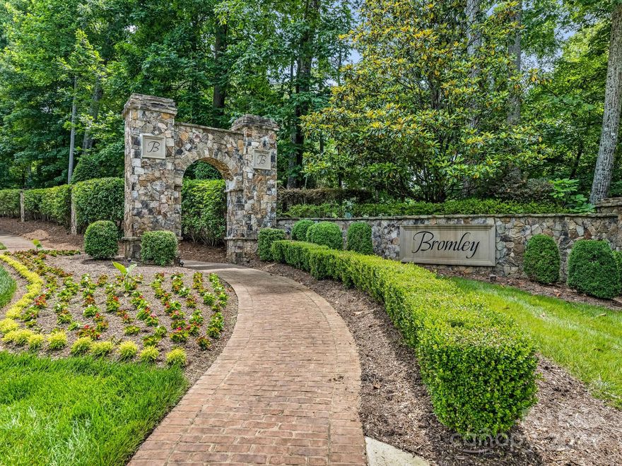 Welcome to luxury living in the prestigious Bromley community of Weddington! Beautiful covered front porch welcomes you to this private 1-acre retreat. A grand double staircase leads to the primary suite boasting a spacious walk-in closet and lavish primary bath. The chef's kitchen, complete with 2 dishwashers, double ovens, gas cooktop and a walk-in pantry, is a culinary masterpiece. Main level includes guest bedroom suite, spacious office & great room with gas fireplace. Large open rooms and soaring ceilings throughout. Upper level boasts spacious secondary bedrooms all with en-suites & a huge bonus room with vaulted ceiling. 3rd floor walk-in attic space provides plenty of storage. Private backyard is perfect for pool oasis as both neighbors have done. Excellent location in highly rated Weddington school district and minutes to shopping, dining & entertainment. Motivated seller offering rate buy down and 1 year membership to Weddington Swim & Racquet Club with full price offer!!