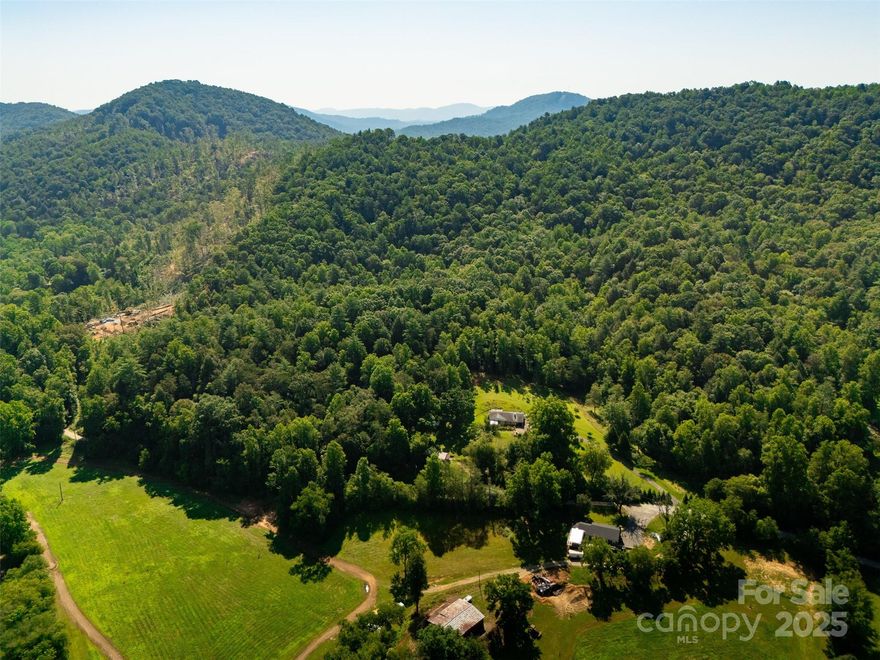 Grab your hiking boots and come explore everything this incredible property has to offer. Nestled in the peaceful Yadkin Valley, this 66.54-acre parcel features various elevation changes, multiple creeks, and numerous potential gentle homesites — whether you prefer building near the base of the property for easy access or taking advantage of the elevated ridgeline for potential long-range views. Hiking trails run throughout the property, with the potential use for ATVs. Trails stretch from the base of the mountain to the top of the ridgeline, where you can enjoy seasonal views. With elevations ranging from approximately 1,200 to 1,600 feet, the land offers a perfect blend of natural beauty and privacy. Whether you're dreaming of a mountain estate, hunting land, a family compound, or a weekend retreat from everyday life, this land is ready for your vision.