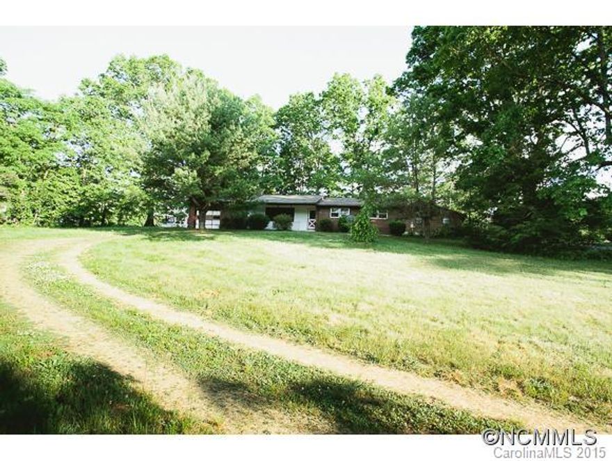 Priced below tax value, this home is full of history and has a property with room to grow making this quite a find. Walk to Lake Tomahawk and to downtown. House in need of TLC and sold as-is, priced right to make this property reach it's full potential. Current Survey Available.