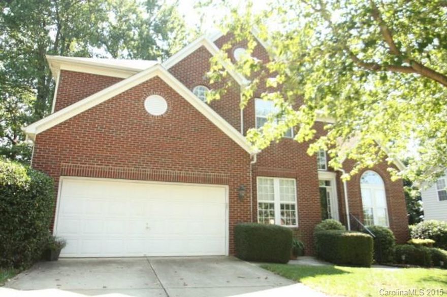 Fabulous 2-story home w/ BOATSLIP! Upgrades galore w/ hardwoods in main area, vaulted GR w/ fireplace & wall of windows, Formal DR w/ wainscoting, Office, open Kit w/ Breakfast also has granite, island & tile backsplash. Guest suite on main. 4 BR's upstairs including Master w/ tile, granite vanities, garden tub & seamless shower. Enjoy the treed lot for privacy/shade from the rear Deck & Screened Porch. Take your boat on LKN from your very own common area boatslip! A must see LKN home!