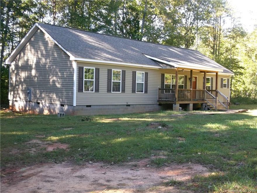 3 bedroom, 3 full bath modular home on 1 acre lot. Needs some repairs.