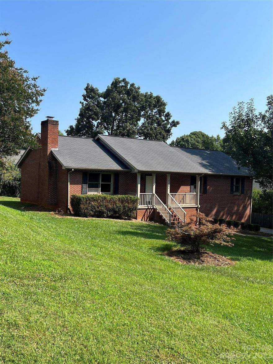 Location at it's best.  Great family neighborhood with spacious rooms and unfinished basement with endless possiblities that already has a full bath.  Large private yard with rocking chair front porch.  Freshly painted with vinyl plank floors and tile.  All brick for easy maintenance.