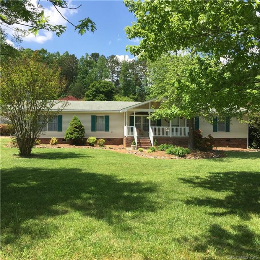 Outstanding opportunity to be in the country with 2 acres, plenty of storage. Very nice double wide mobile home finished very well inside with all the appliances included including washer and dryer.  3 car-garage with work shop.