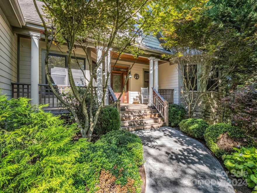 Welcome to your dream home in a scenic gated community, offering over 2,700 square
feet of thoughtfully designed open living space. The home boasts hardwood floors with
intricate inlays, triple crown molding, and tiered ceilings, adding a touch of elegance. The
living area is framed by large windows that provide ample natural light and adjoins a generous dining room and a chef’s kitchen. The versatile
bonus room upstairs is perfect for a home office, playroom, studio, or guest suite. In the
Primary Suite, enjoy the “treehouse” view, or relax in the luxurious jacuzzi bathtub,
surrounded by mature trees and lush greenery. In the winter, marvel at the stunning view
of Mnt Pisgah from your back porch.  Features a whole-house generator, and the full unfinished basement offers the potential to almost
double your living space if desired. Additionally, the community offers private access to
the French Broad River and a river park, perfect for outdoor activities and scenic walks.