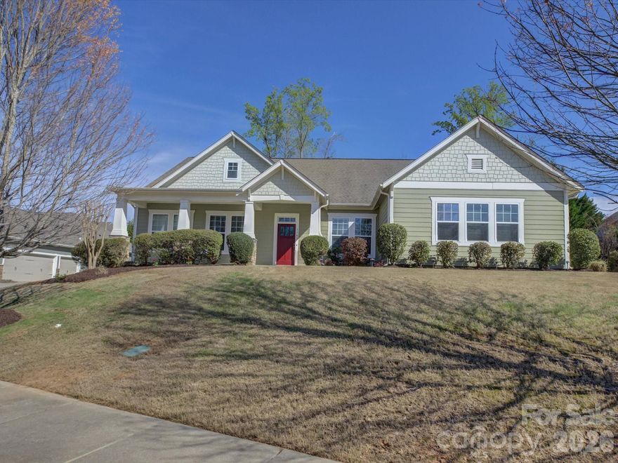 A beautifully designed home in the sought-after estate section, featuring one of the community’s most popular floor plans. A welcoming, open layout is enhanced by extensive hardwoods and abundant natural light. The spacious kitchen is the heart of the home, showcasing a large island that flows seamlessly into the great room—perfect for entertaining and everyday living. A private office with French doors offers the ideal work-from-home space, while a luxurious primary suite on the main floor provides a private retreat. A guest suite on the main floor adds comfort and convenience. Upstairs, enjoy a generous loft/flex space—perfect for media, play, or relaxation—alongside large secondary bedrooms. Unwind on the screened porch overlooking your outdoor space, creating the perfect blend of indoor and outdoor living.