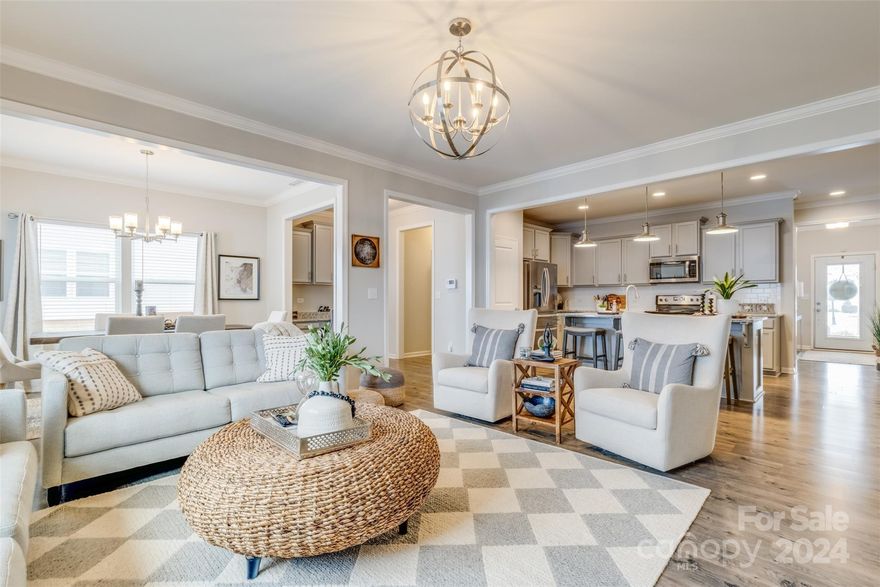 Here is your second chance at this beautiful home!! Back on at no fault of seller! Carefree living in this stylish end unit townhome built in 2019 & nestled in the desirable Fort Mill School District. Enjoy resort-style amenities including a refreshing pool, tennis courts, and scenic walking trails just moments away. Inside, you'll find an inviting open floor plan with updated lighting, sleek granite countertops, and airy 9-ft ceilings. Stay organized with a convenient drop zone and tackle tasks effortlessly in the dedicated computer niche. Upstairs, the centrally positioned flex space boasts a loft-style design, providing versatility and functionality. Additionally, you'll appreciate the nearby laundry room with built-in storage, along with two additional bedrooms. With a spacious primary suite featuring custom closet systems and double sinks, as well as a practical 2-car garage, this home offers modern comfort in a convenient location. Don't miss out!