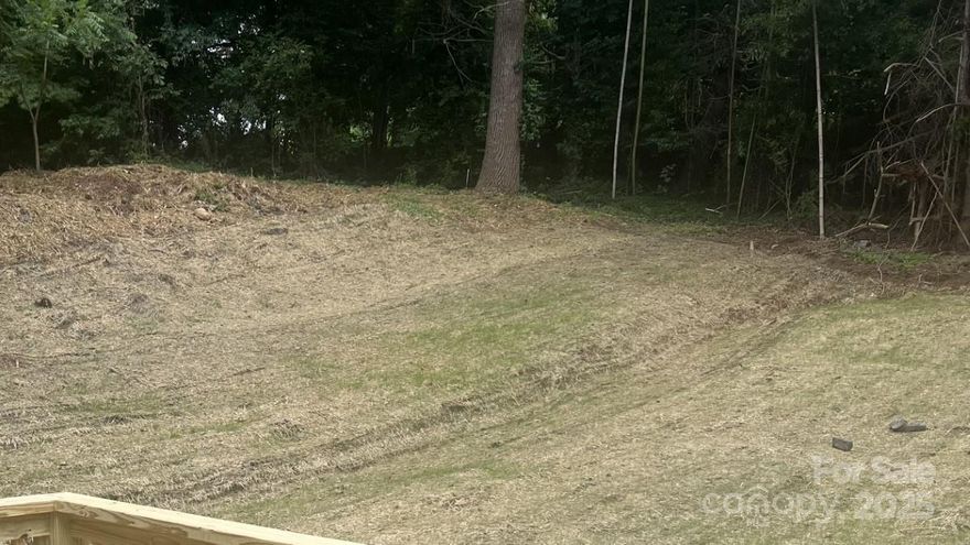 Beautiful Lot In A Swannanoa Subdivision With City Water, City Sewer, & Natural Gas!  See Attached Survey (Lot 1B).  Property To Be Deed Restricted To No Mobile Homes & No On-Frame Modulars.