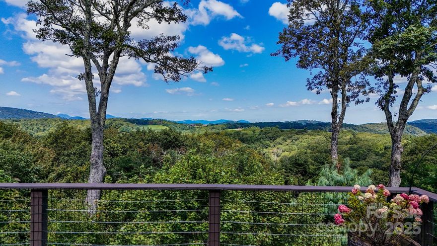 Long range views and prime location! A combination of timeless Blowing Rock charm and modern mountain living. This 3,893 square foot home sits at the highest point (~4000ft) in the town of Blowing Rock. It features five bedrooms and four baths, providing plenty of space for family and guests to relax and unwind. This cherished home was thoughtfully designed and expanded by Enterline and Russell, in 2010. The heart of the home is the expansive dream kitchen boasting elegant marble and soapstone surfaces, and Wolf and Sub-Zero appliances. Indoor living spaces seamlessly open to a large deck offering sweeping long-range views. Relax from your day’s adventures by one of the three soaring stone fireplaces, and behold more breathtaking views as you stroll around Green Hill Circle - the skyline of Charlotte is visible on a clear day. A short golf cart drive to Blowing Rock Country Club and minutes to downtown Blowing Rock.