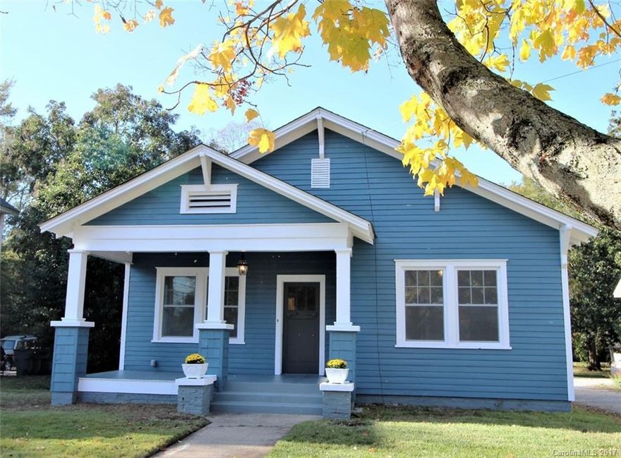 Beautifully renovated, this craftsman style home is located in the heart of Clover, SC.  Steeped in yesteryears charm w/ todays conveniences!  The rocking chair front porch welcomes you to 209 Kings Mountain St., then the hardwood floors lure in the front door. Clean colors & sunlight line the rooms. Custom cabinetry, granite & stainless appliances in the kitchen. Tiled main bath w/shiplap walls! Large bedrooms w/ lots of closet space! Back deck overlooks the park like back yard! 2 car garage!