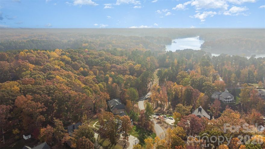 Discover the potential of this beautiful 1.80-acre lot overlooking Lake Norman in the peaceful Greenbay Forest community. Tucked away in a quiet, natural setting, yet only 4 miles from I-77 (Exit 36) and minutes from Hwy 150, this property offers the perfect balance of privacy and accessibility. The community requires a minimum 2,200 sq ft build for single story and 3,000 for 2 story, ensuring quality and consistency among neighboring homes. Whether you’re envisioning a custom dream home, a luxury lake retreat, or an investment property for Airbnb or long-term rental, this lot delivers endless opportunity. A previous septic permit was issued (now expired), and no current permit is on record with Iredell County. Create your own private getaway surrounded by the tranquility of Lake Norman living.