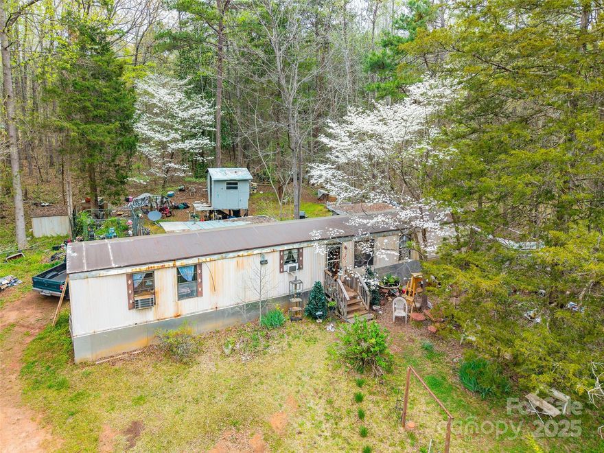 This 2 bedroom, 2 bath home, with an additional flex space that could serve as a third bedroom or office, is set on a spacious 10.25-acre property. The land offers plenty of room for outdoor activities and provides a peaceful setting. With ample space and privacy, this property serves as a retreat while still being conveniently located near downtown York. Enjoy the quiet of country living with easy access to local amenities and major highways.