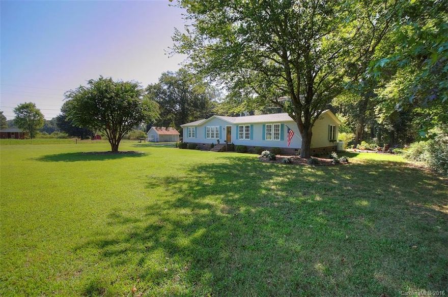 3BR/2BA double wide manufactured home on 9.47 acres of peaceful land in Union County! In ground pool, screened porch, detached office/workshop (14x16, heated and cooled), storage building (8x8), large backyard with wooded privacy, fire pit, upgraded landscaping, pasture, barn (20x24). Interior features beautiful updates including laminate wood floors, fireplace, stainless steel appliances, etc. New roof in 2014. Move in ready home with clean neutral finishes in excellent location.