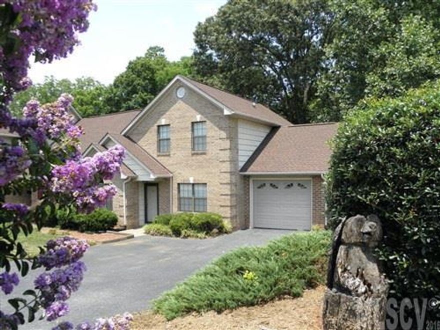 OUTSTANDING townhouse ready for new owner. Step inside and be greeted with beautiful ceramic tile floors and a dramatic staircase for a grand first impression. The large living area and dining area share a vaulted ceiling with a terrific view from above. The kitchen was designed extremely well with plenty of cabinets, counter space and a large pantry. Off the kitchen is the laundry room which leads to the large one car garage with plenty of storage. The second level bedrooms area large rooms with great closet space and, share a hall bath. There is a large rear patio, perfect for cooking out and enjoying sunny days. The exterior is all maintenance free, roof was replaced in 2006. This townhouse has been meticulously maintained over the years and is move-in ready. Come take a look.