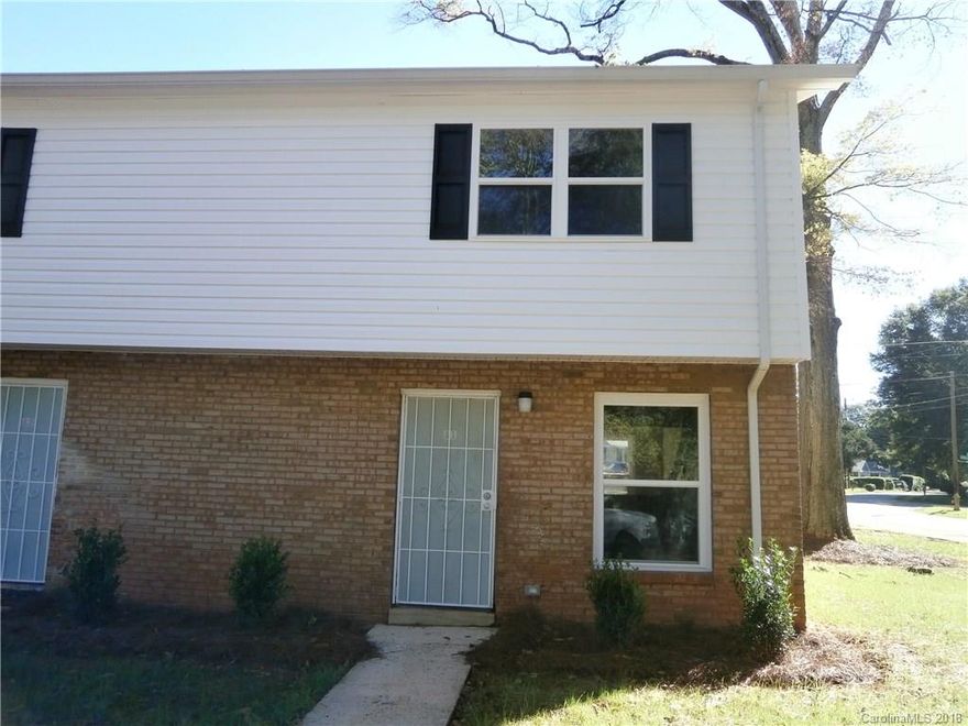 Recently renovated 2 bedroom 1 bath townhome. Large open living room with fresh paint and new flooring. Updated kitchen equipped with refrigerator, stove, and microwave. Upstairs are two bedrooms with refinished hardwood floors and a nice remodeled bathroom. Washer/Dryer connections for stackable unit. All electric