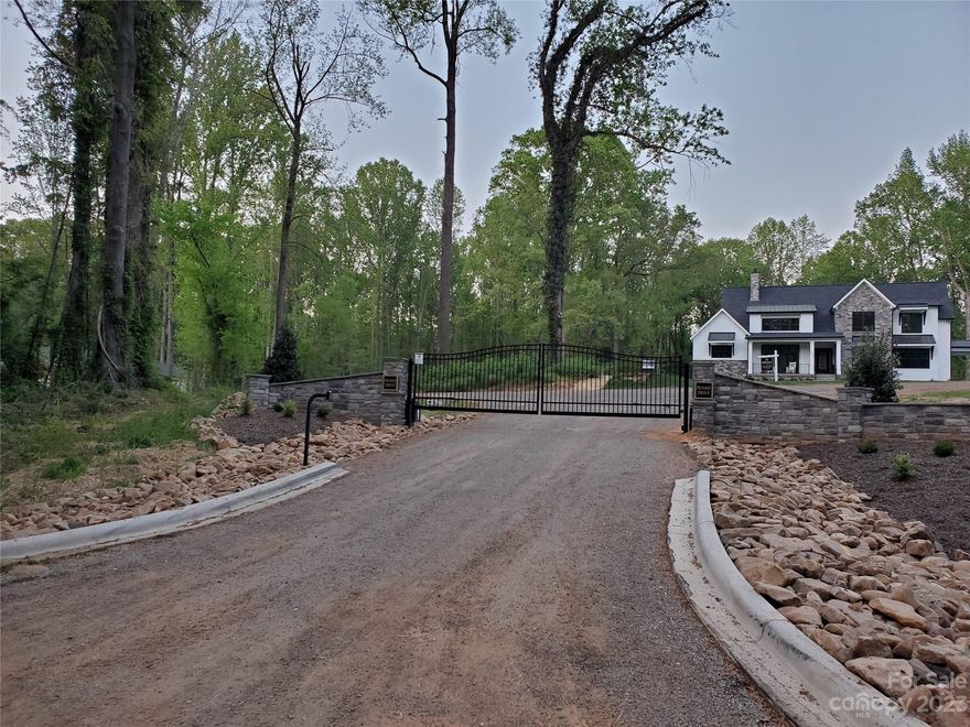 Gorgeous estate sized lot in newer luxury subdivision in Huntersville.  The building pad has been cleared but the rest of the lot is wooded. A private gated driveway provides access to the homes. Close to 485, shopping and schools. Sellers bought the lot to build their custom dream home but ended up buying another home. This is Lot 1 in Olde Poplar. There were 7 lots and this is the last one. Don't miss out on one of Huntersville's best kept secrets. Most of the homes in here are over $1M. Bring your own builder or listing agent can recommend one.