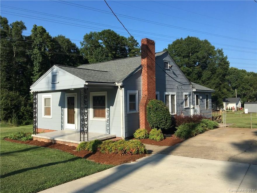 Adorable cottage/bungalow home on over 3/4 acre lot. 2 bedroom and 1 full bath with a large den for extra space. The living room features a fireplace w/gas log connection in place. The interior is craftsman-style with natural wood sills and baseboards, hardwood floors and stained glass inserts in the windows. The kitchen is the heart of this home. Comes complete with gas range, refrigerator and cast iron sink. Oak cabinets with stain glass inserts add a special touch. Nice deck. Level yard.