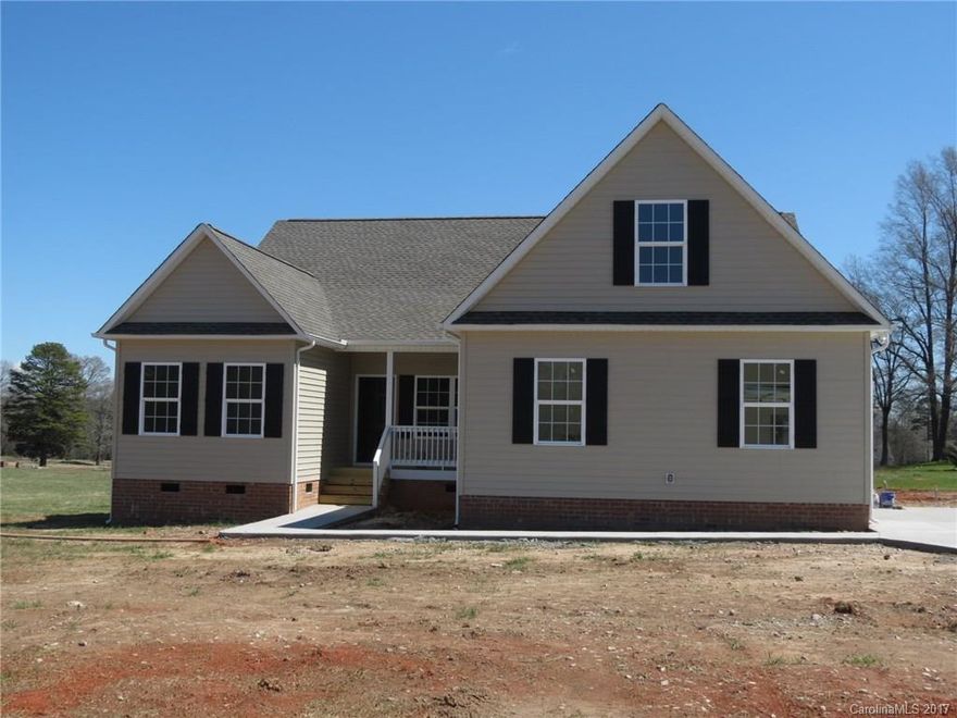 New home on 1.19 Acres with no HOA. This 3 bedroom 2 bathroom home has wood floors throughout. It is a split bedroom, open floor plan. Granite countertops in the kitchen and bathrooms. Finished bonus room above the garage. Formal dining room. Kitchen and family room overlook the country-like setting that this house sits on. Covered back porch great for entertaining.