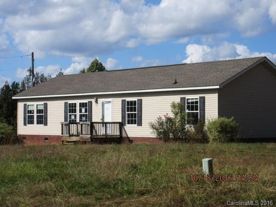 Modular home on corner lot with lots of potential.  Large, split bedroom plan.  Short drive from I-77, schools and shopping.