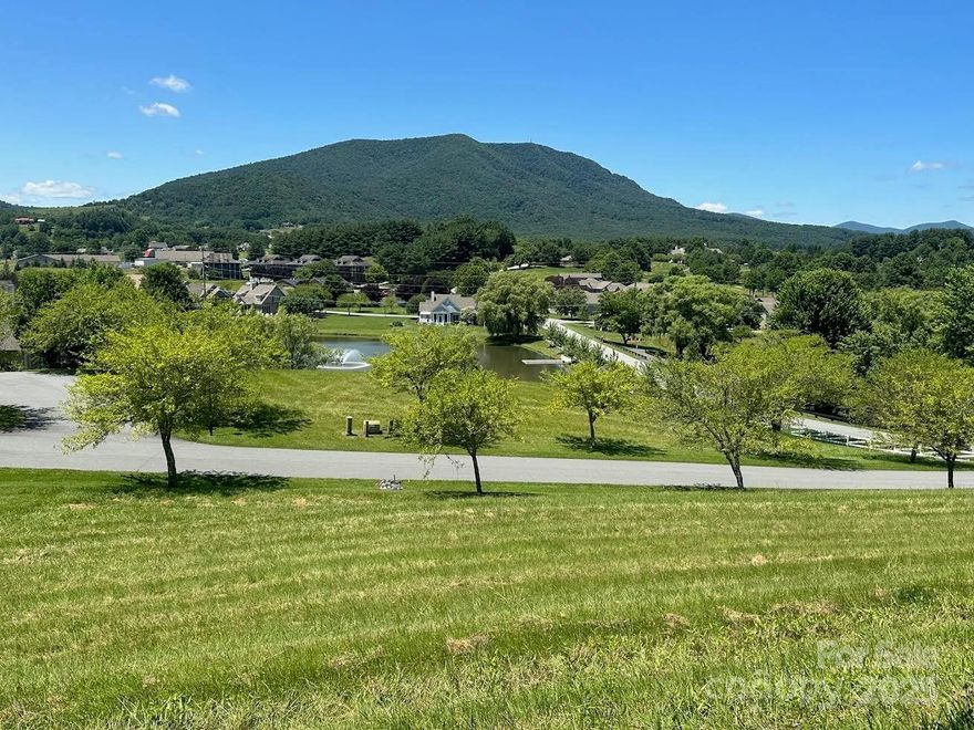 This homesite offers a breathtaking panoramic views of the community and the surrounding mountains with partial golf course & water views. Great spot for a house plan with a walk-out lower level! Jefferson Landing, a gated golf community, w/ 18 hole course, pool/fitness center, pickleball /tennis courts and Riverside Park, adjoining the New River. Coming this spring: Himalayan style putting course & seven par 3 practice holes. $1000 Capital Improvement pd to the JL POA, by the buyer at closing.