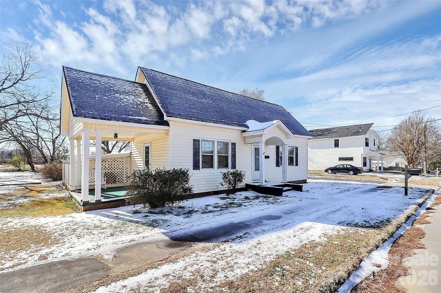 Super Charmiing 2 Bedroom/ 1 Bath Home with New LVP Flooring, New  Bathtub/Shower, New Bathroom Vanity, New Ceiling Fans, New Stove, New Cooktop & New Microwave!  Outdoor Storage Shed and a Carport!   HVAC is Only One Year Old! Clean and Turn Key!